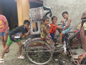 Children posing, San Carlos, Negros Occidental, Philippines