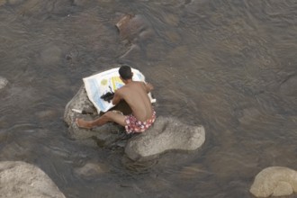 Fisherman has caught catfish, Negros Occidental, Philippines