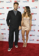 Allan Russell and Jana Kramer at the 2025 iHeartRadio Music Festival held at T-Mobile Arena in Las
