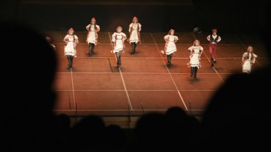 Young dancers from Fire of Anatolia perform a folkloric sequence in Gaziantep, wearing costumes