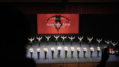 Members of Fire of Anatolia, also known as Anadolu Atesi, bow to the audience after their