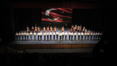 Members of Fire of Anatolia, also known as Anadolu Atesi, bow to the audience after their
