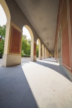 Historic arcades with symmetrical columns and shadow play, Munich, Germany