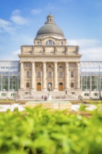 Impressive building with dome and columns, surrounded by greenery, Munich, Germany