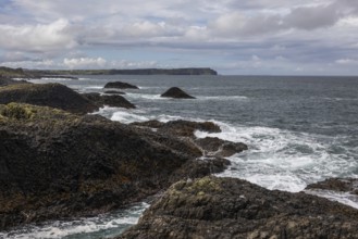 Rocky coast, offshore islands, Ballintoy Harbour, Causeway Coastal Route, Antrim, Northern Ireland,