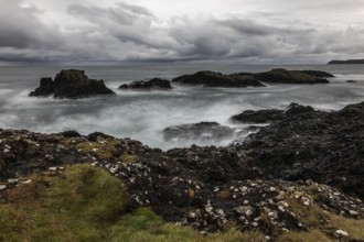 Rocky coast, offshore islands, Ballintoy Harbour, Causeway Coastal Route, Antrim, Northern Ireland,