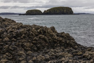 Rocky coast, offshore islands, Ballintoy Harbour, Causeway Coastal Route, Antrim, Northern Ireland,