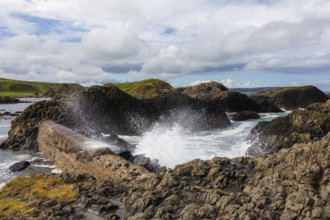Breakwater at the fishing harbour, Ballintoy Harbour, Causeway Coastal Route, Antrim, Northern