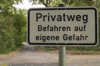 Borken, NRW, Germany, German sign warning people about entering a private road at their own risk