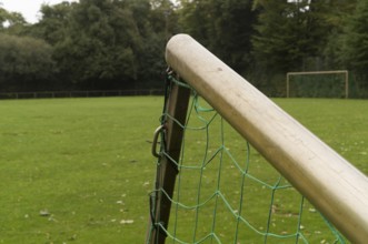 Borken, NRW, Germany, Soccer goal with green net on an empty grass field