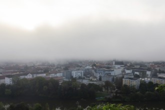 The city of Leoben in the early morning fog, Leoben, Styria, Austria