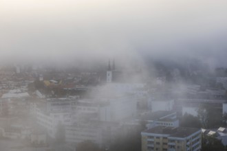 The city of Leoben in the early morning fog, Leoben, Styria, Austria