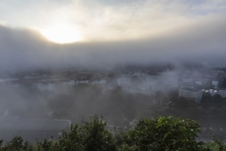 The city of Leoben in the early morning fog, Leoben, Styria, Austria