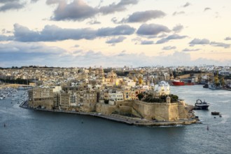 Beautiful sunset view of Valletta with Saint Angelo Fortress, capital city of Malta