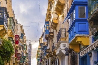 Wonderful historic houses with colorful wooden balconies in La Valletta, capital city of Malta