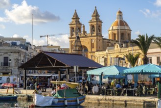 Beautiful view of Marsaxlokk, traditional maltese fisherman village on south of the island, Malta