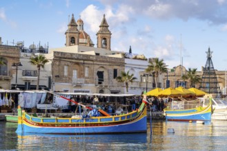 Beautiful view of Marsaxlokk, traditional maltese fisherman village on south of the island, Malta