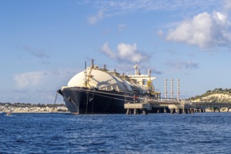 Floating Storage Unit or FSU next to power station by Marsaxlokk, south of Malta