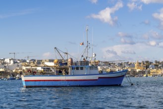 Beautiful view of Marsaxlokk, traditional maltese fisherman village on south of the island, Malta