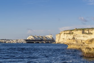 Floating Storage Unit or FSU next to power station by Marsaxlokk, south of Malta