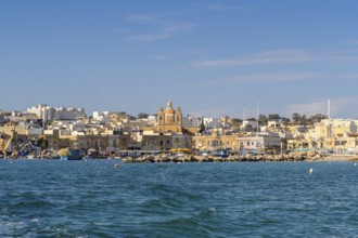 Beautiful view of Marsaxlokk, traditional maltese fisherman village on south of the island, Malta