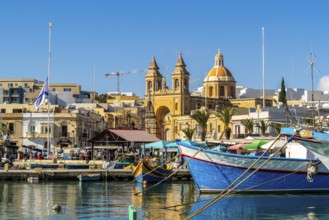 Beautiful view of Marsaxlokk, traditional maltese fisherman village on south of the island, Malta