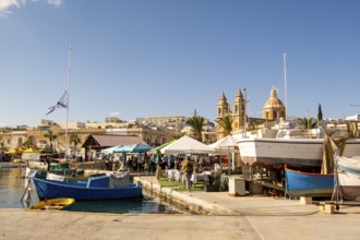 Beautiful view of Marsaxlokk, traditional maltese fisherman village on south of the island, Malta