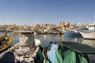 Beautiful view of Marsaxlokk, traditional maltese fisherman village on south of the island, Malta