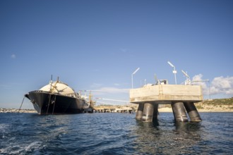 Floating Storage Unit or FSU next to power station by Marsaxlokk, south of Malta