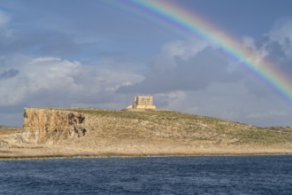 Amazing view of rainbow after the rain above Comino island, Malta