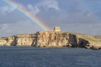 Amazing view of rainbow after the rain above Comino island, Malta