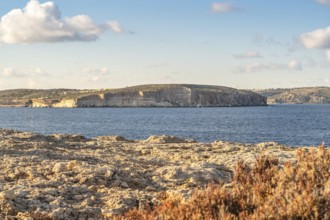 Comino island seen from northern part of Malta, Armier Bay, Malta