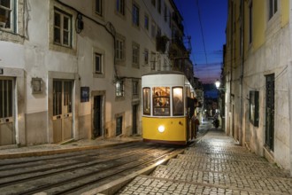 Traditional yellow train in Lisbon - capital of Portugal