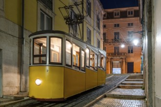 Traditional yellow train in Lisbon - capital of Portugal