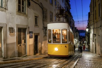 Traditional yellow train in Lisbon - capital of Portugal