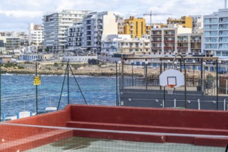 Saint Paul's Bay city view with sport zone in the foreground, Malta