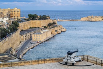 Seafront view of historic La Valletta with Lower Barrakka gardens, taken from Upper Barrakka