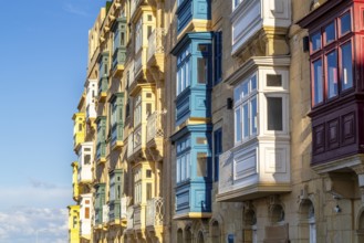 Amazing historic houses with colorful wooden balconies in La Valletta, capital city of Malta