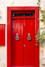 Wooden red doors in La Valletta, capital city of Malta