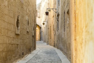 Street view with lanterns in historic L-Imdina, Rabat, Malta