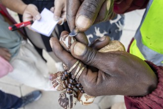 A keychain made from the Makalani nut, one of the traditional materials commonly used in Namibian