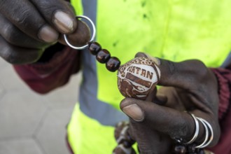 A keychain made from the Makalani nut, one of the traditional materials commonly used in Namibian