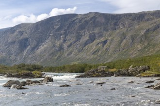 River Sjoa in front of the rock face of Mount Besseggen, Jotunheimen National Park, Tessanden,