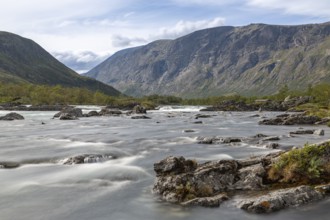 River Sjoa in front of the rock face of Mount Besseggen, Jotunheimen National Park, Tessanden,