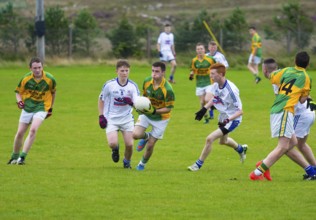 CLIFDEN, IRELAND, AUGUST 30, 2015: Young Men Playing a Match of Gaelic Soccer