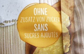 Ingredients Sugar label on a packet of cornflakes. German and French
