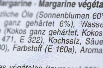 List of ingredients on a packet of margarine. Focus on table salt, salt