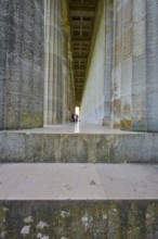 Long colonnade with people in the background, emphasised by a vanishing point, Walhalla,