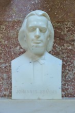 Marble bust of Johannes Brahms against a reddish background, Walhalla, Donaustauf, Regensburg,