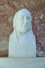 Reflective marble bust of Jean Paul, classical style against a red background, Walhalla,